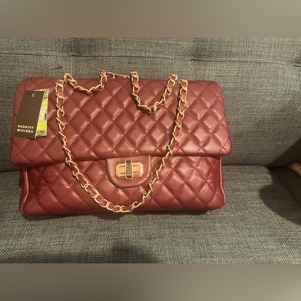 Burgundy color messenger bag , beautiful and brand new with tag